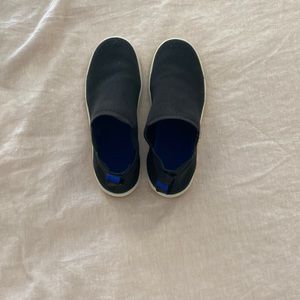 Rothy’s black Chelsea sneaker.